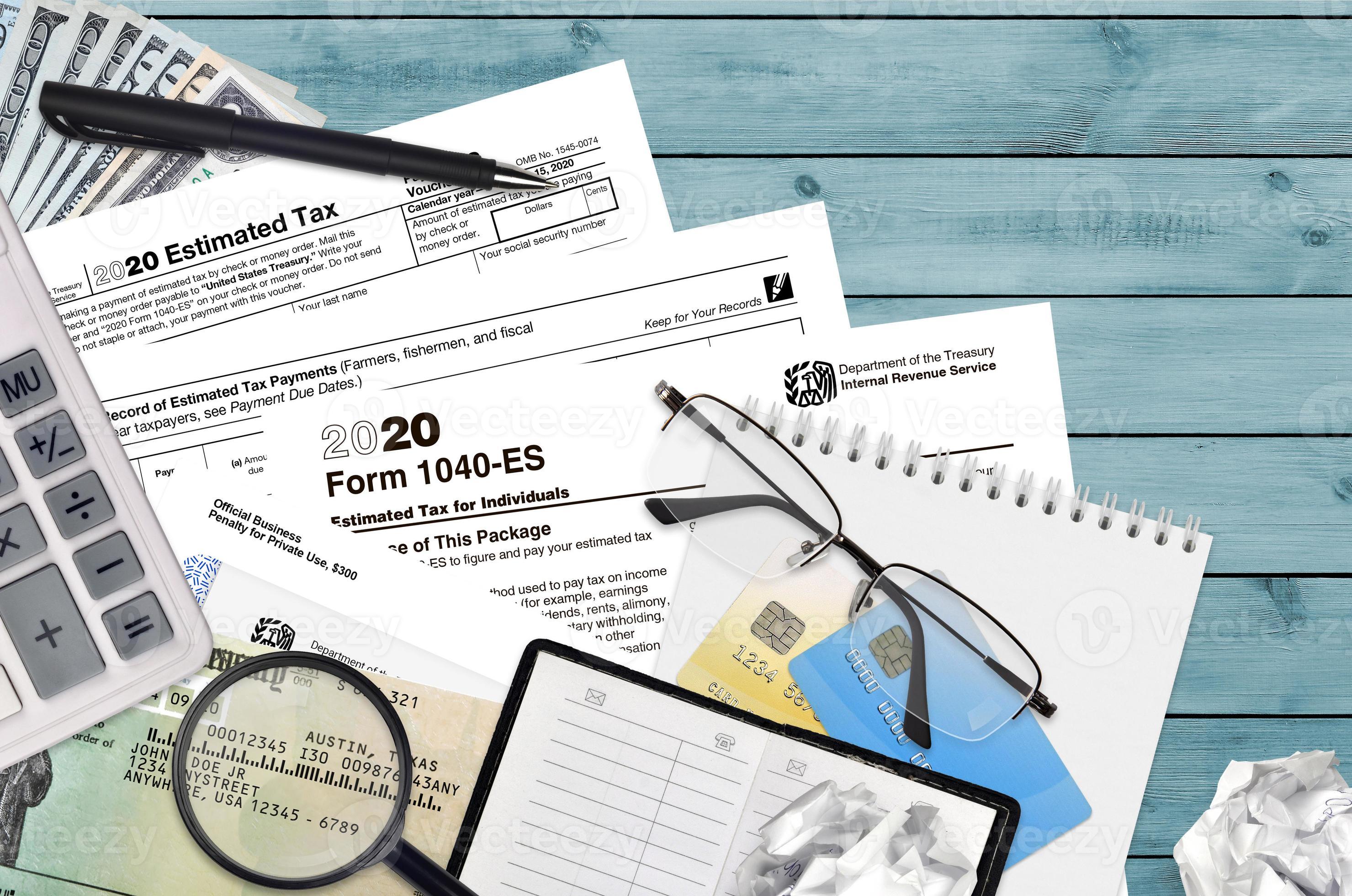 IRS form 1040es Estimated tax for Individuals lies on flat lay office