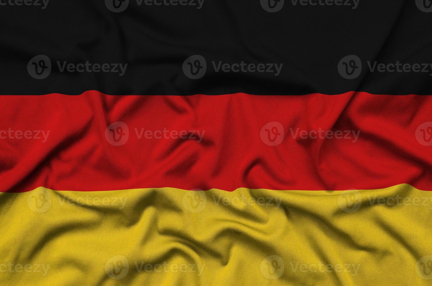 la bandera de alemania está representada en una tela deportiva con muchos pliegues. bandera del equipo deportivo foto