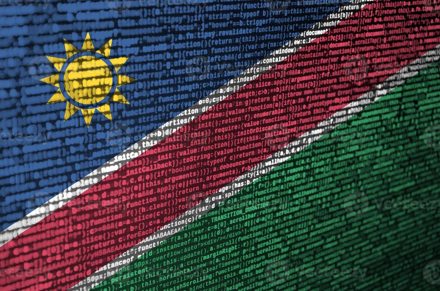 Namibia flag is depicted on the screen with the program code. The concept of modern technology and site development photo