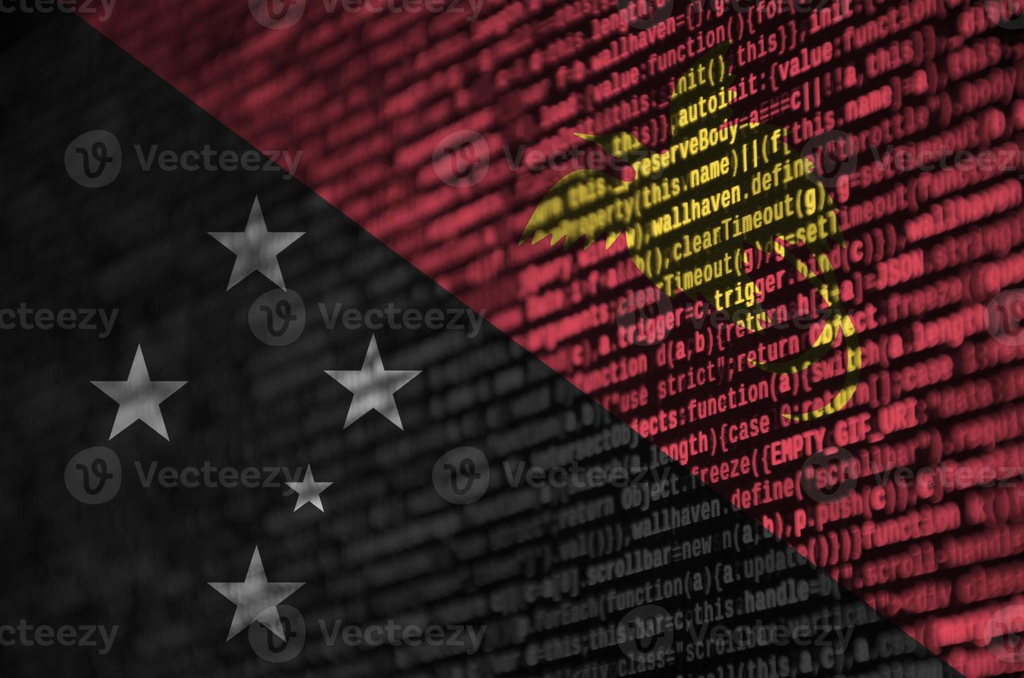 Papua New Guinea flag is depicted on the screen with the program code. The concept of modern technology and site development photo