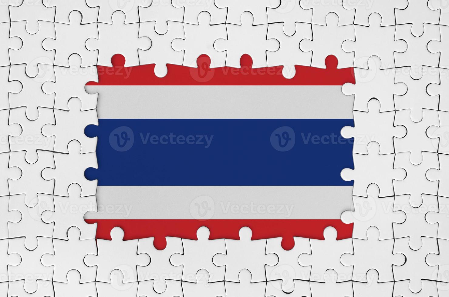Thailand flag in frame of white puzzle pieces with missing central part photo