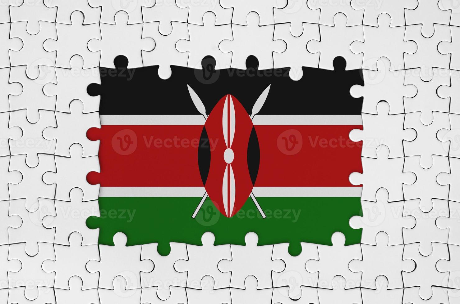 Kenya flag in frame of white puzzle pieces with missing central part photo