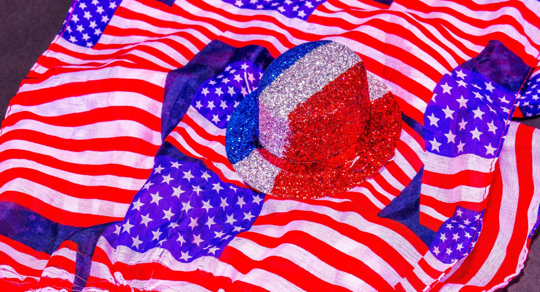 Sparkly Red, White And Blue Party Hat On American Flag Scarf photo