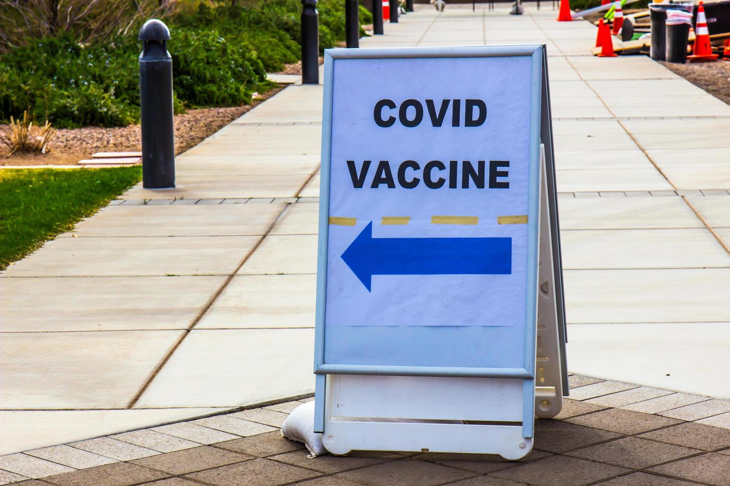 Covid 19 Vaccination This Way Sign photo