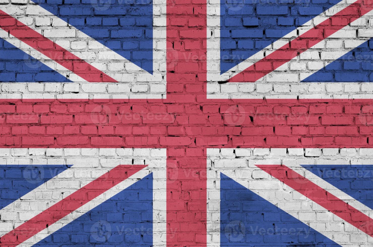 Great britain flag is painted onto an old brick wall photo