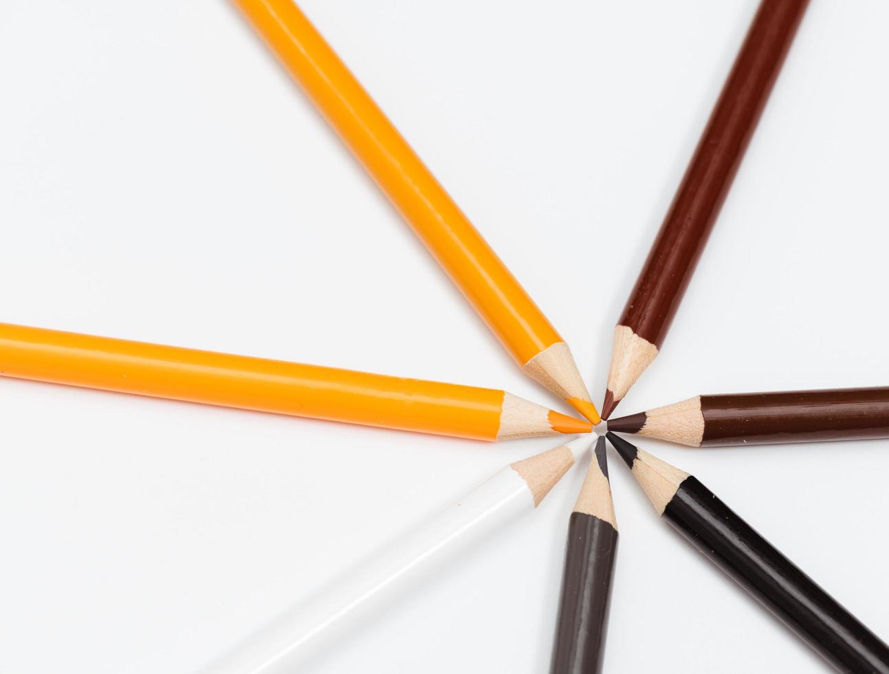 Multi color pencils. the concept of a multinational family and equality in the world. photo