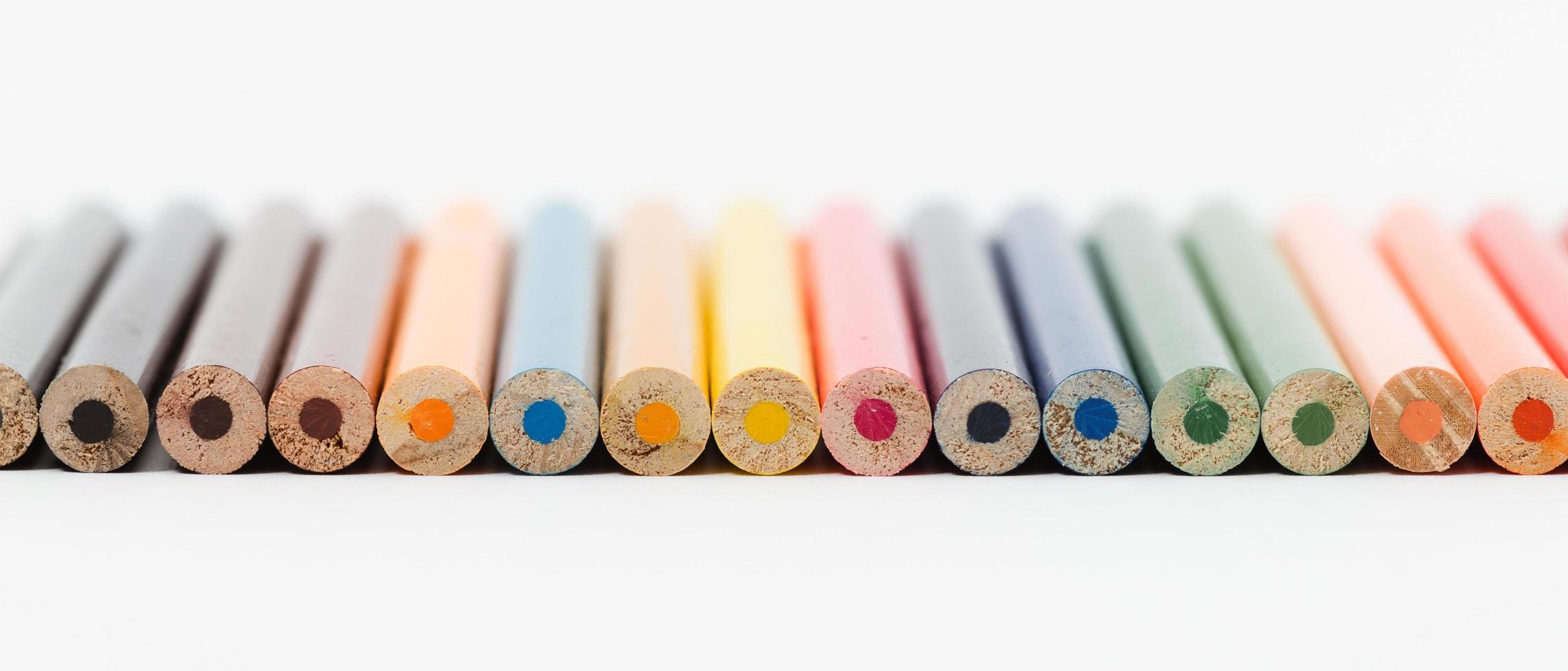 Multi color pencils. the concept of a multinational family and equality in the world. photo