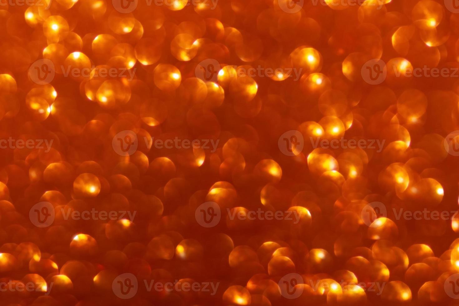 Red orange abstract blurred background. Soft focus. Defocused. Summer, Spring, Merry Christmas or Happy New Year bokeh. Copy space photo