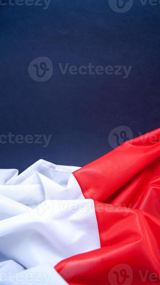 Folded White and Red Flag of Poland photo