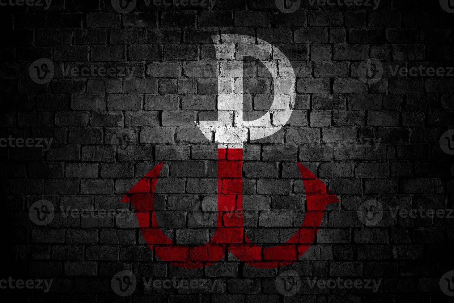 White and Red sign of Warsaw Rising  on brick wall in grunge style with colors of polish flag. Poland country industrial city graphic. World War Two. photo