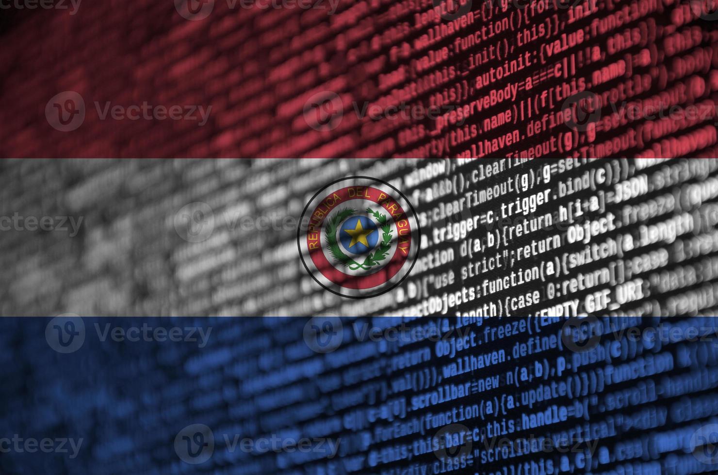 Paraguay flag is depicted on the screen with the program code. The concept of modern technology and site development photo