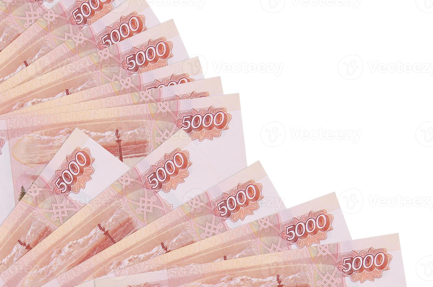 5000 russian rubles bills lies isolated on white background with copy space stacked in fan close up photo