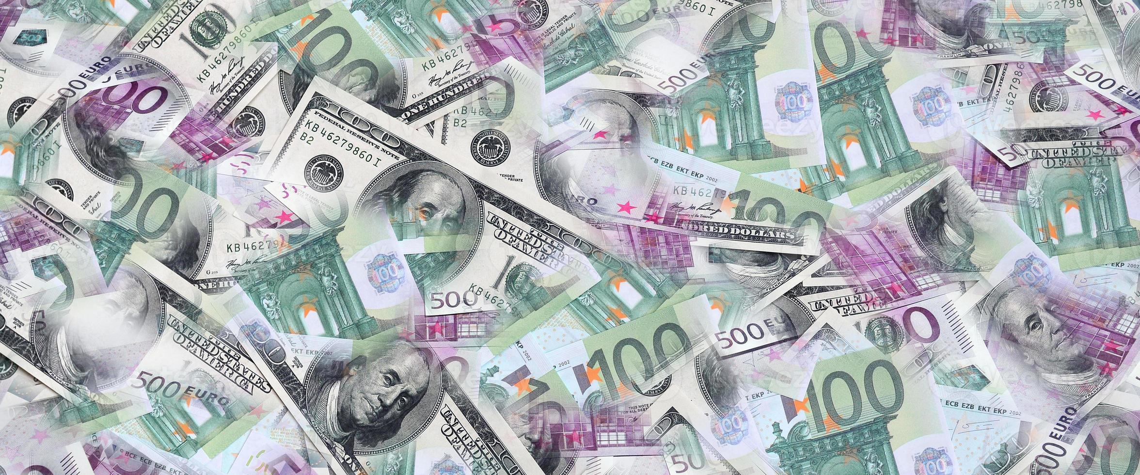 A collage of many images of euro banknotes in denominations of 100 and 500 euros lying in the heap photo