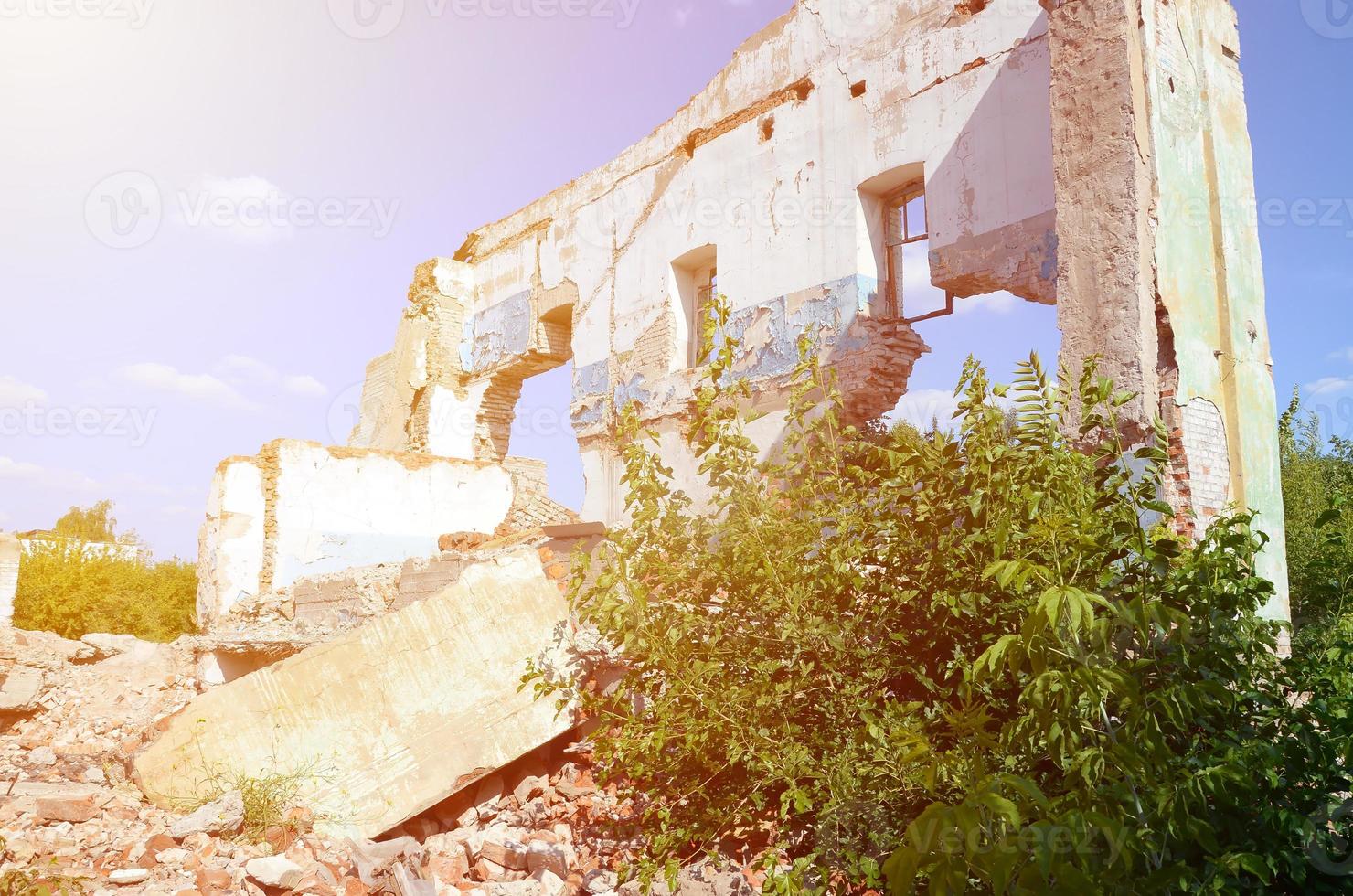 Collapsed industrial multistorey building in daytime photo