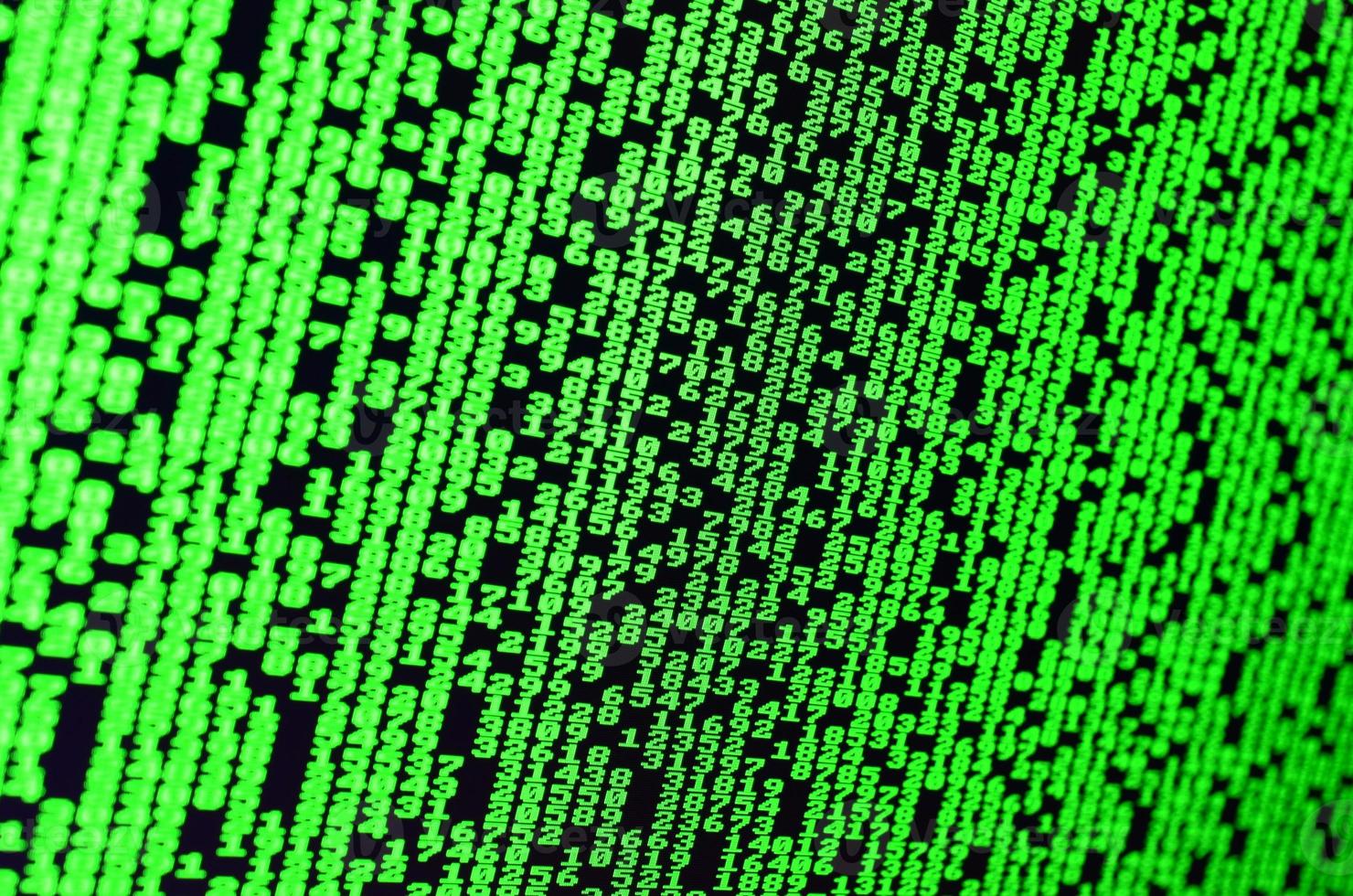 Macro of password selection on the monitor of the office computer. The concept of hacking the protection of a personal data keeper. The stream of supposed digital passwords of four and five digits photo