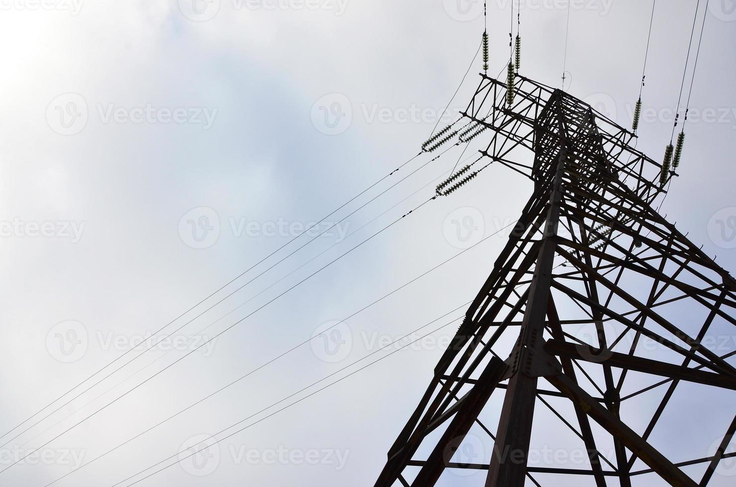 High Voltage Electric Tower. Electricity transmission pylon photo