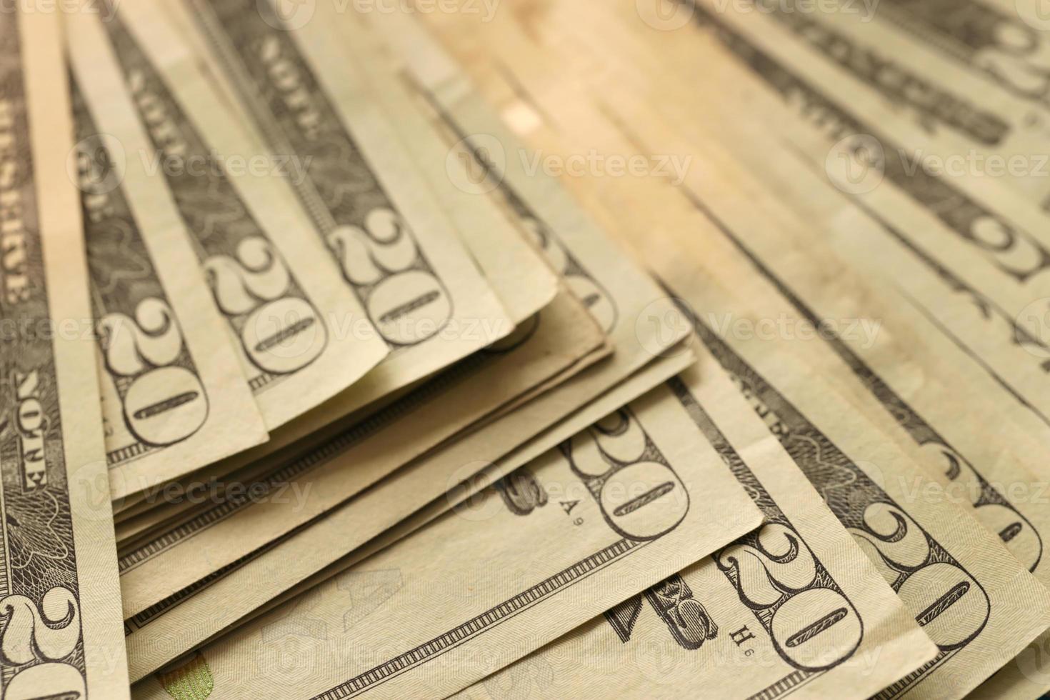 Big amount of old 20 dollar bills details on macro photography. Money earnings, payday or tax paying period photo