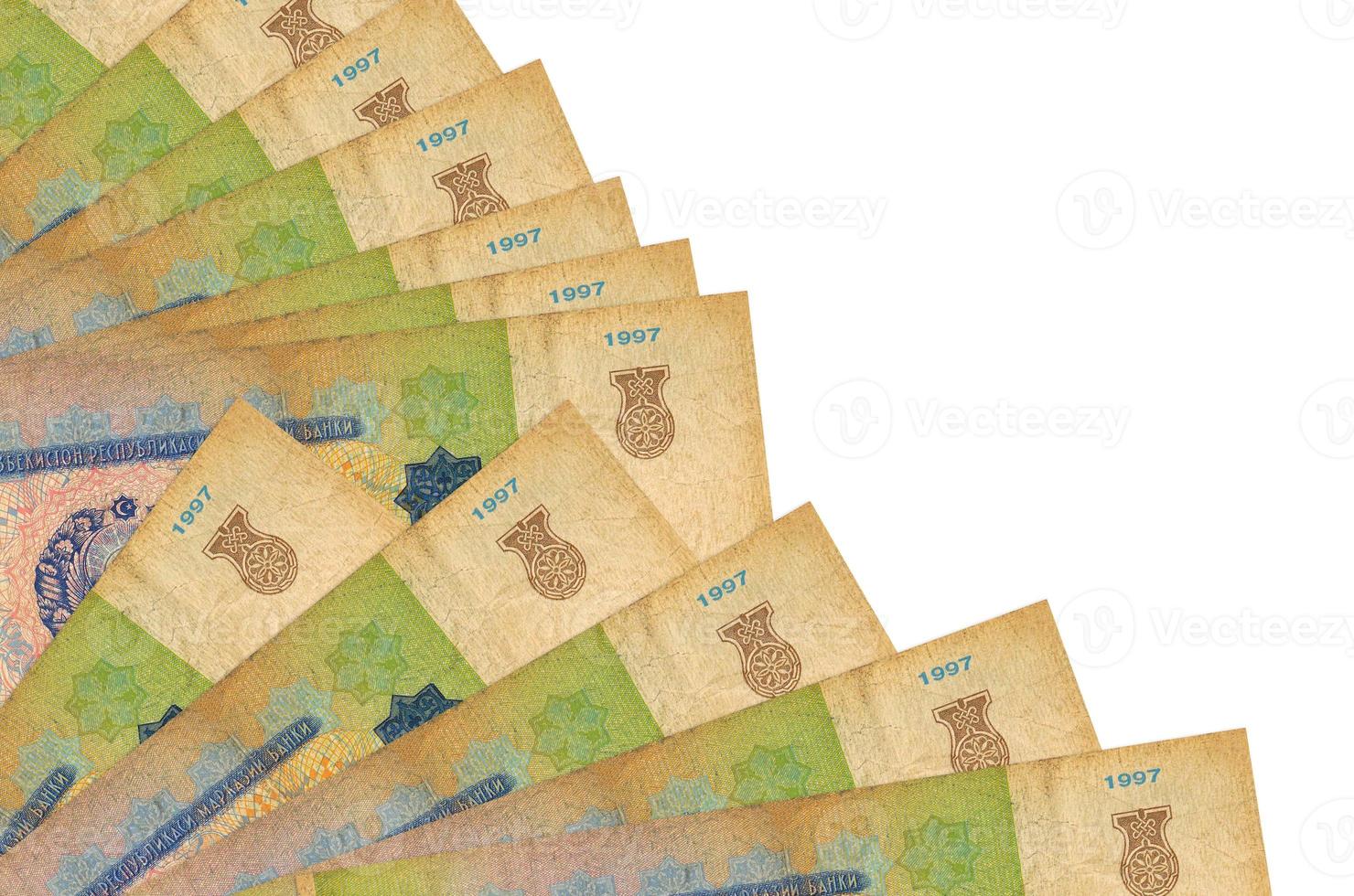 200 Uzbekistani som bills lies isolated on white background with copy space stacked in fan close up photo