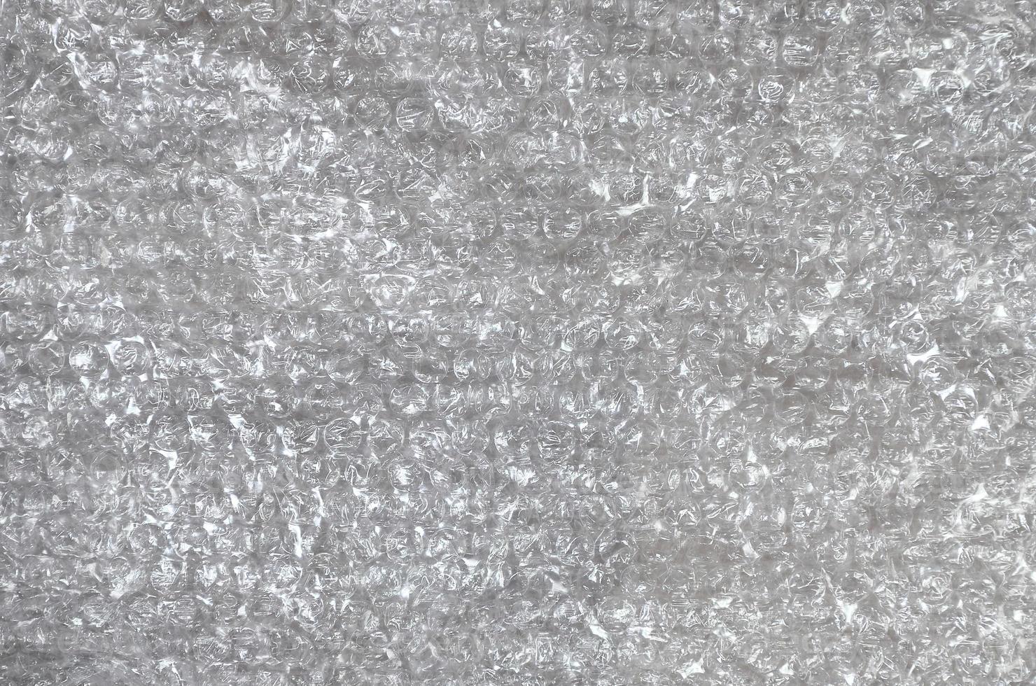 White bubble Wrap Packing Or Air Cushion material. Abstract Texture For Creative Art Work, Close Up dfckground, Top View with Copy Space photo