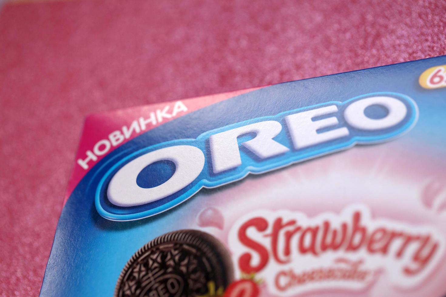 TERNOPIL, UKRAINE - MAY 28, 2022 Oreo strawberry cheesecake crispy cookie box. The brand Oreo is owned by company Mondelez international photo