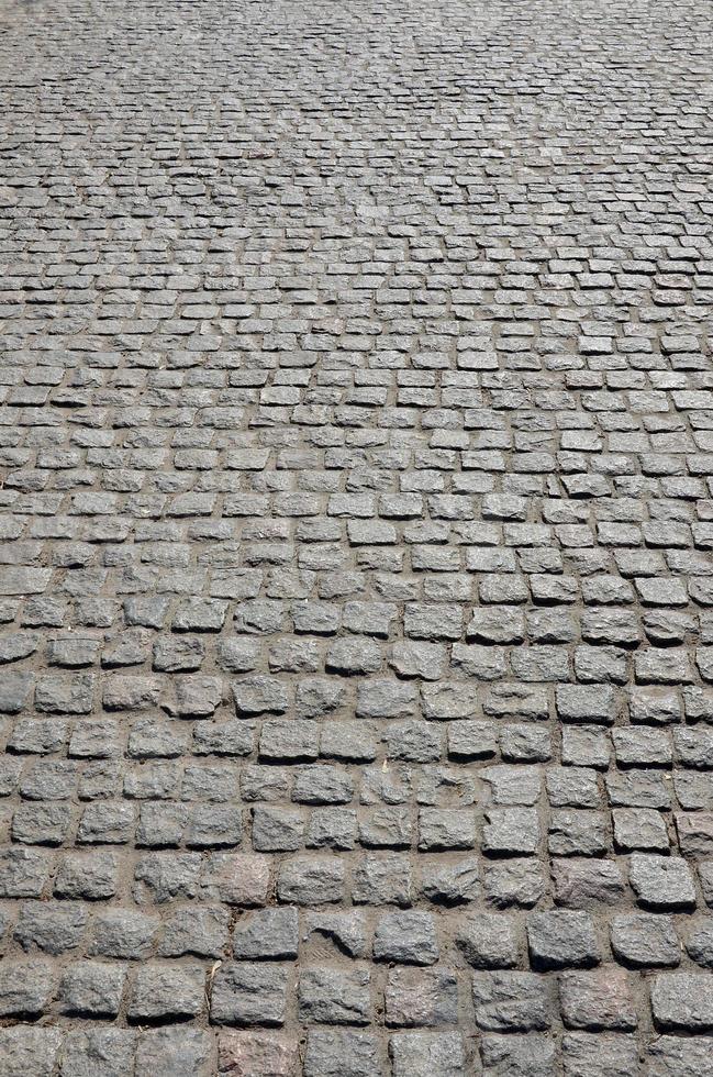 Background photo close-up of a large platform of paving stone in perspective