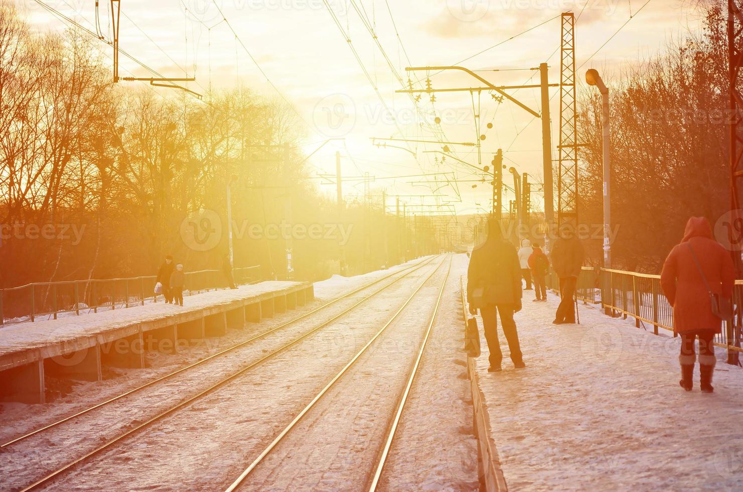 Evening winter landscape with the railway station photo