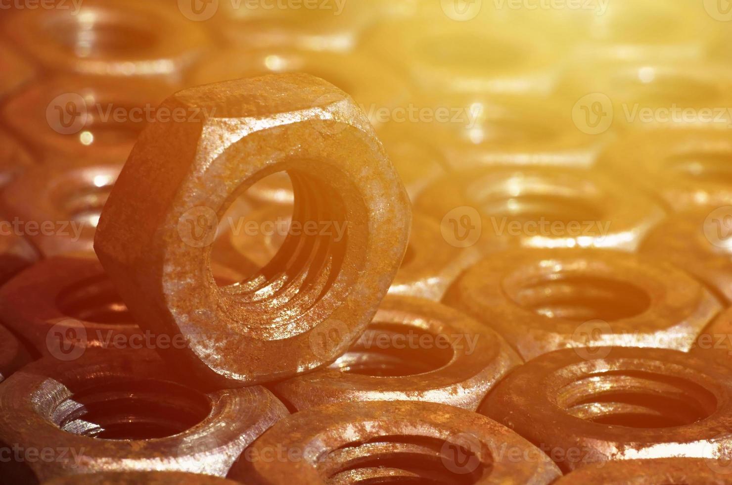 Close-up of rusty nuts photo