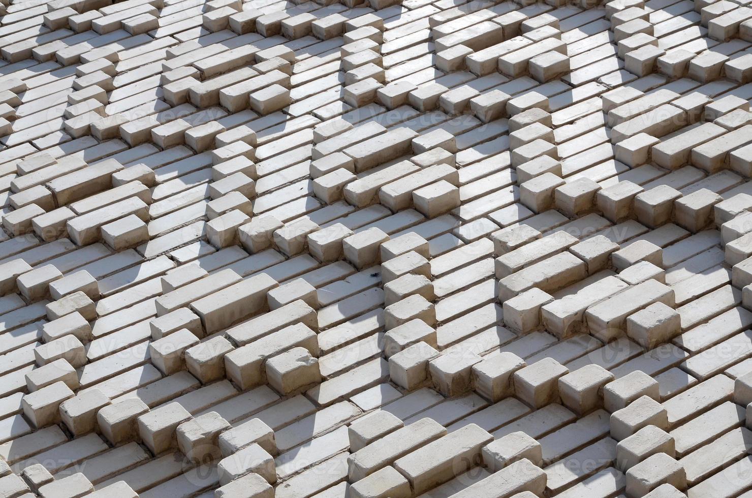 A pattern made of white bricks in the form of diamond shapes. Decoration of the walls during the Soviet Union photo