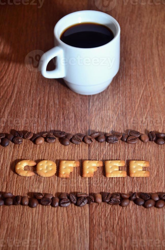 English word Coffee, made up of salt cracker letters photo