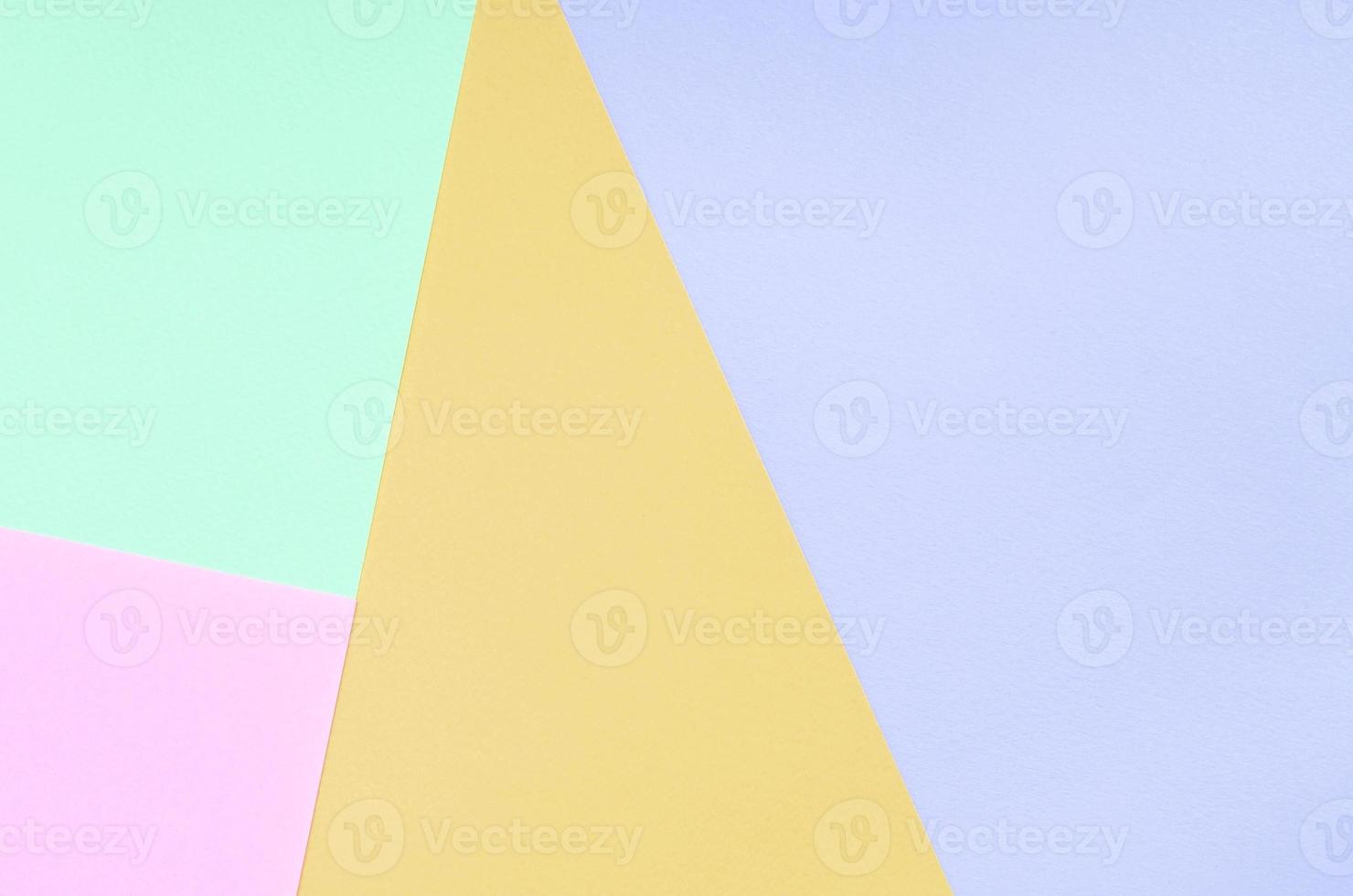 Texture background of fashion pastel colors. Pink, violet, orange and blue geometric pattern papers. photo
