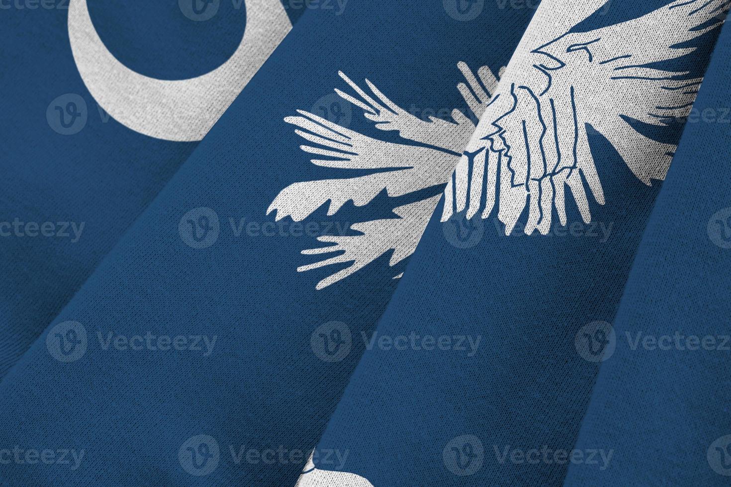 South Carolina US state flag with big folds waving close up under the studio light indoors. The official symbols and colors in banner photo