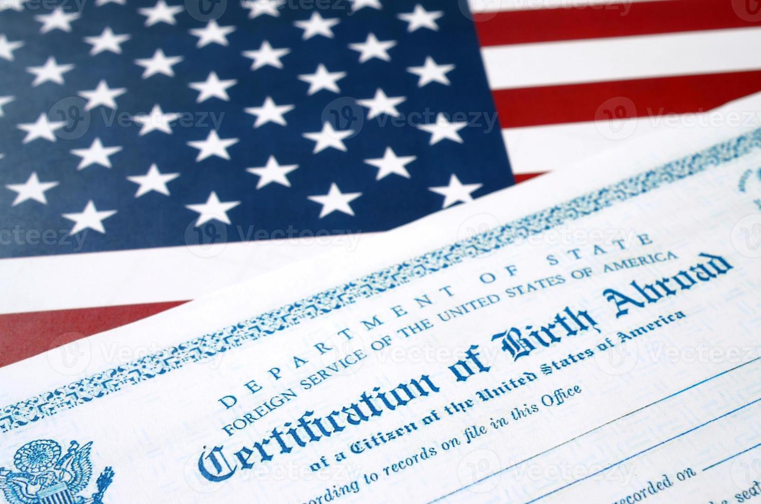 Fs-545 Certification of birth abroad lies on United States flag from US Foreign service photo