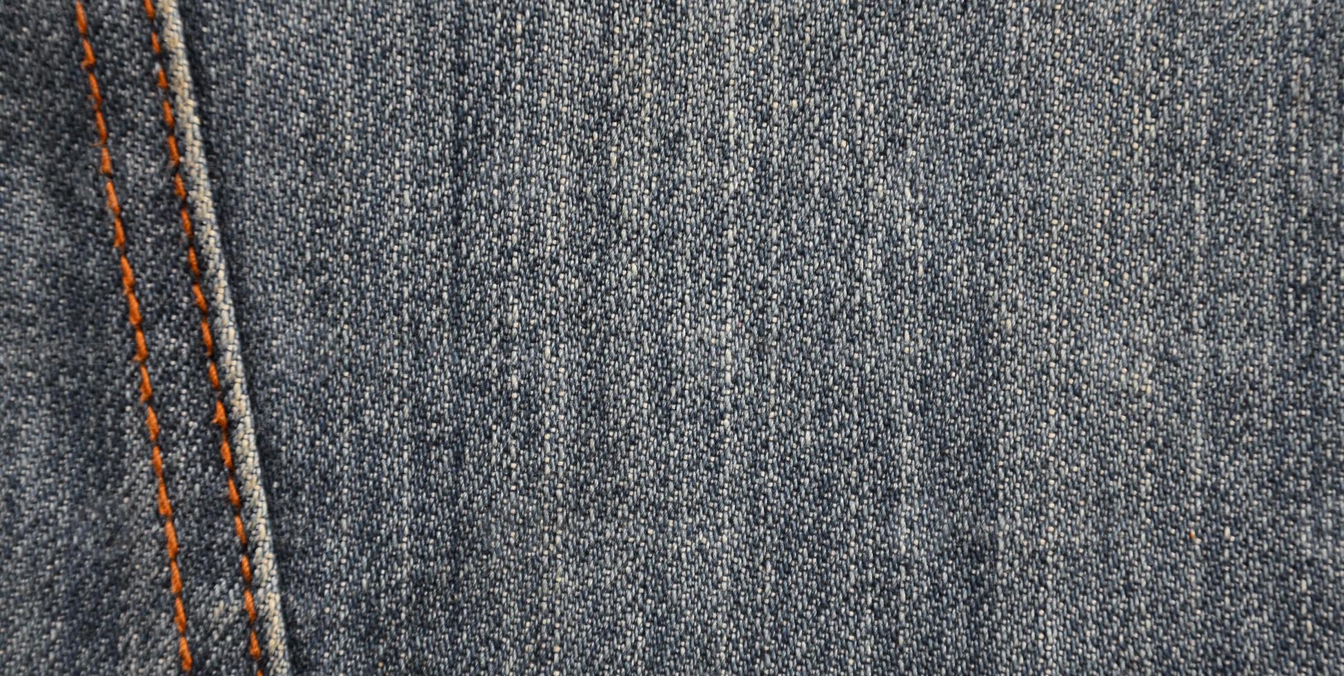 Detailed texture of dark denim cloth photo