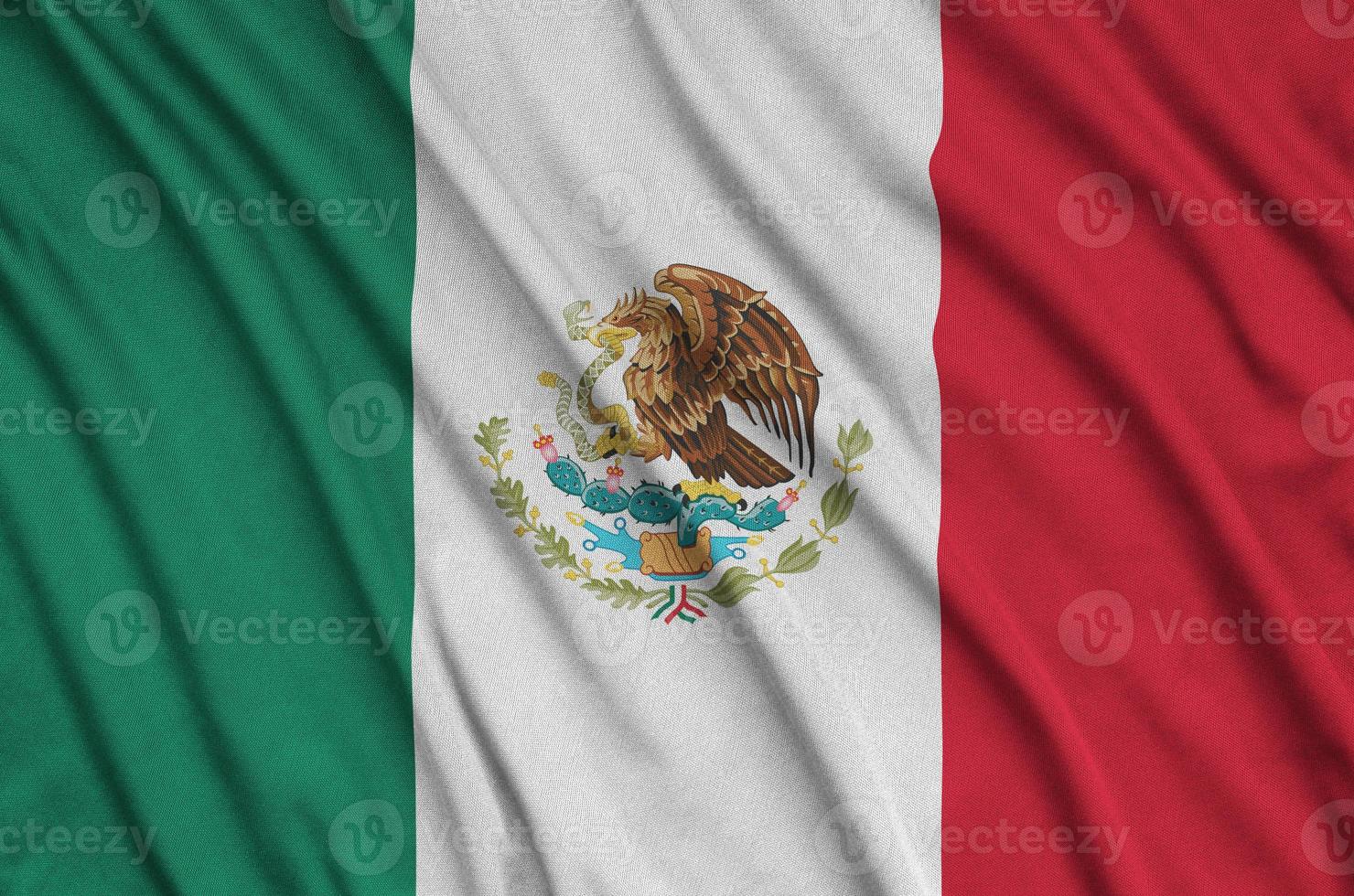 Mexico flag is depicted on a sports cloth fabric with many folds. Sport team banner photo