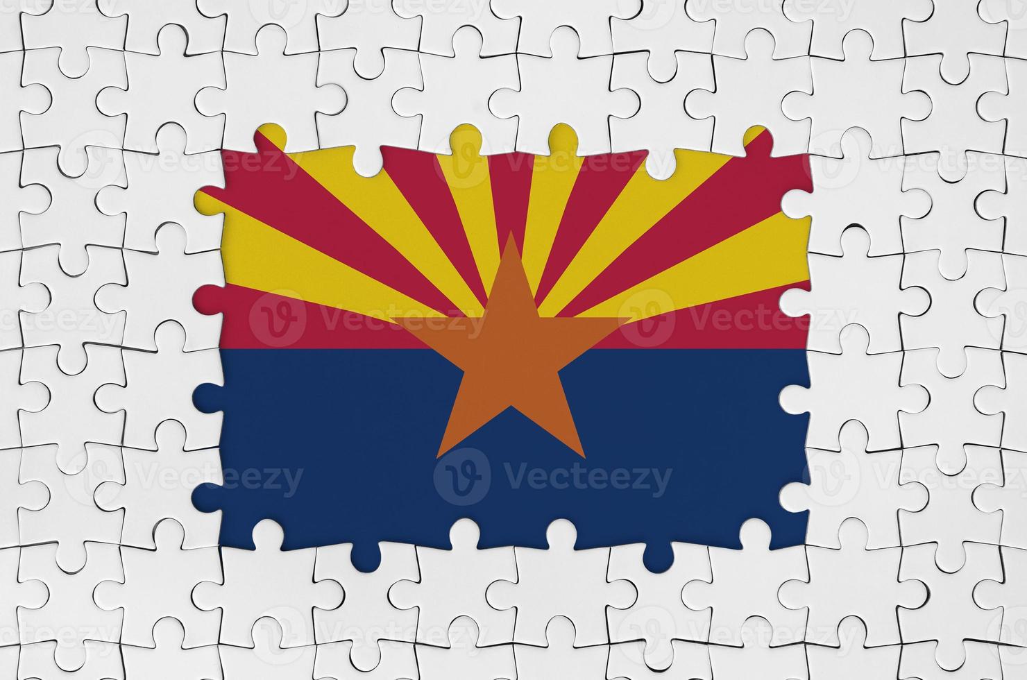 Arizona US state flag in frame of white puzzle pieces with missing central part photo