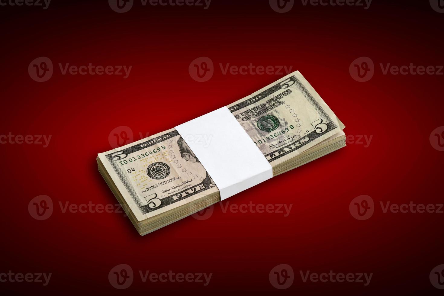 Bundle of US dollar bills isolated on white. Pack of american money with high resolution on perfect white background photo