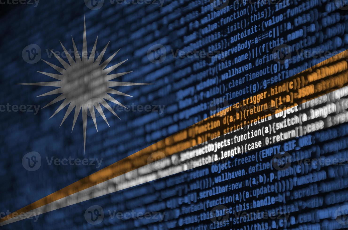 Marshall Islands flag is depicted on the screen with the program code. The concept of modern technology and site development photo