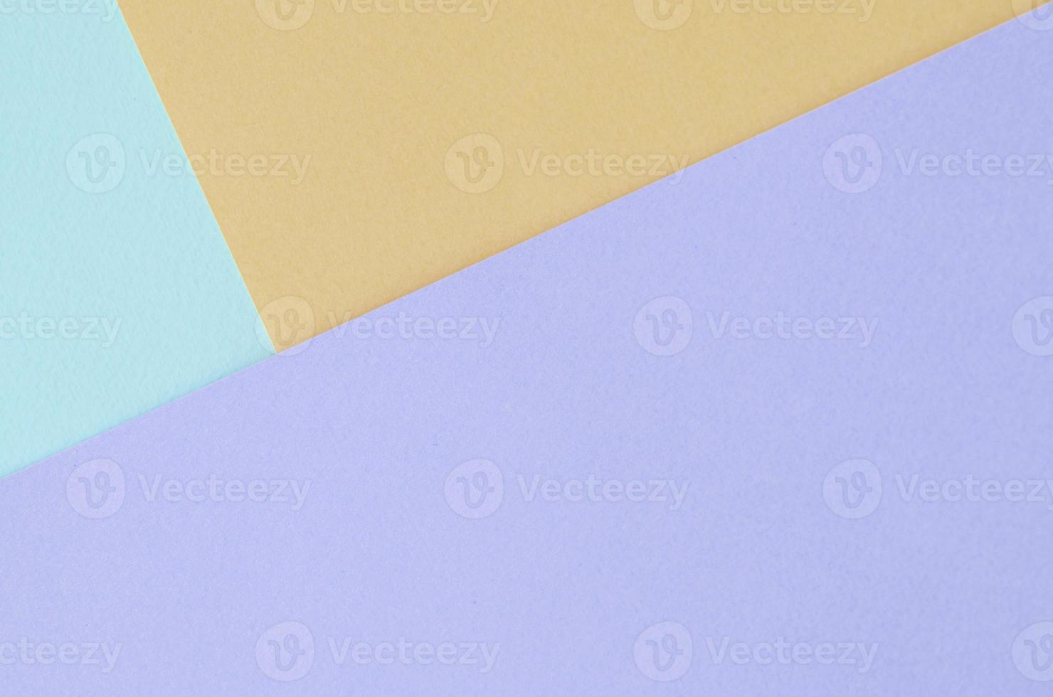 Texture background of fashion pastel colors. Violet, orange, and blue geometric pattern papers. photo