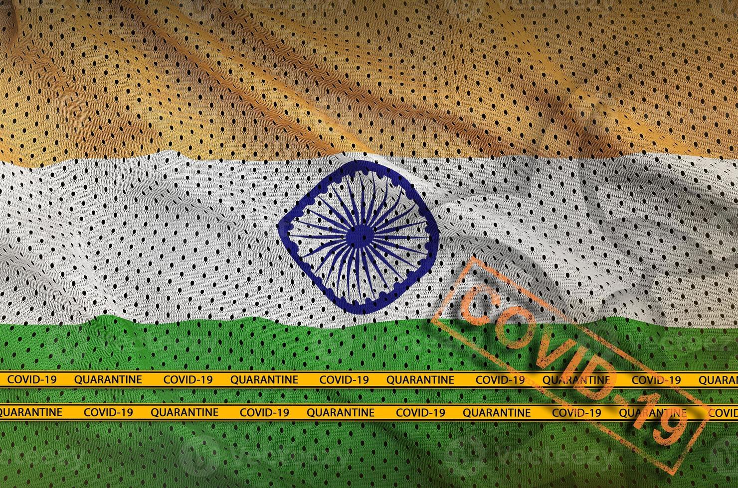 India flag and orange Covid-19 stamp with border tape. Coronavirus or 2019-nCov virus concept photo