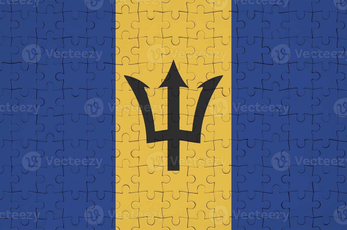 Barbados flag is depicted on a folded puzzle photo