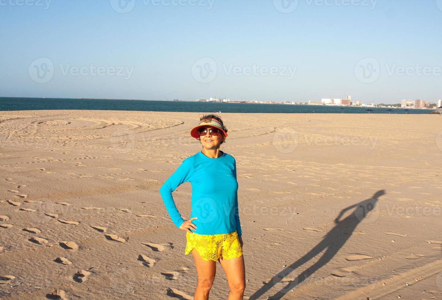 Lady standing at Iracema Beach in Fortaleza, Brazil, Ceara photo