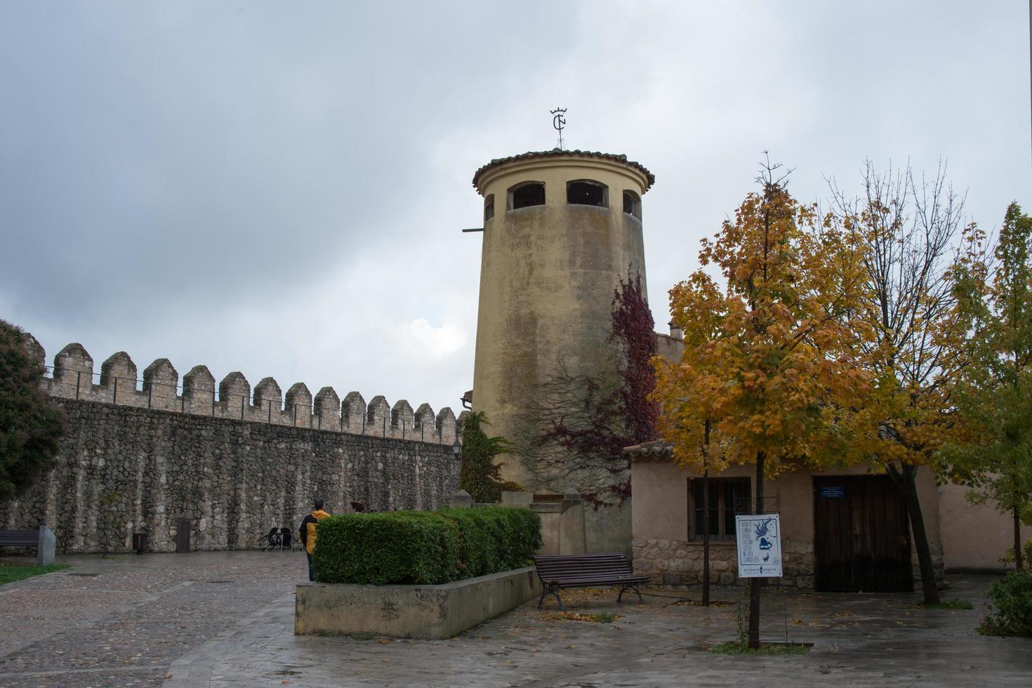 Autumn colors in Uruena. Stone fortress. photo