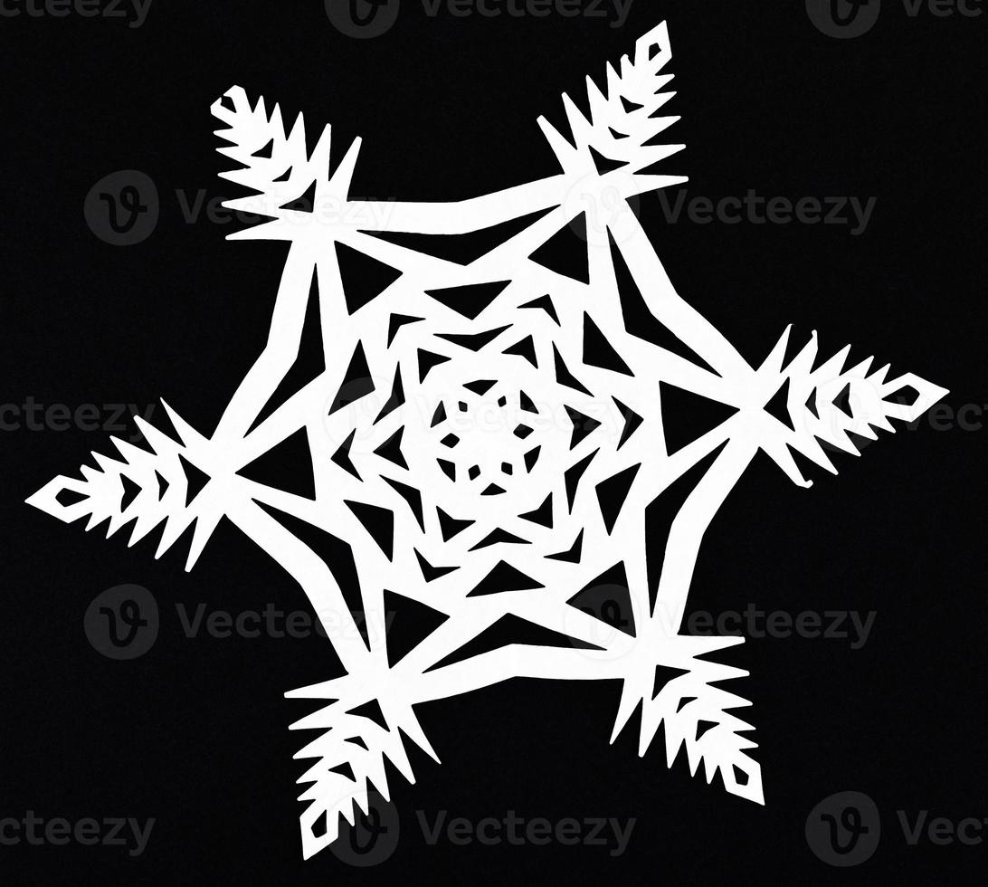 snowflake on black paper photo