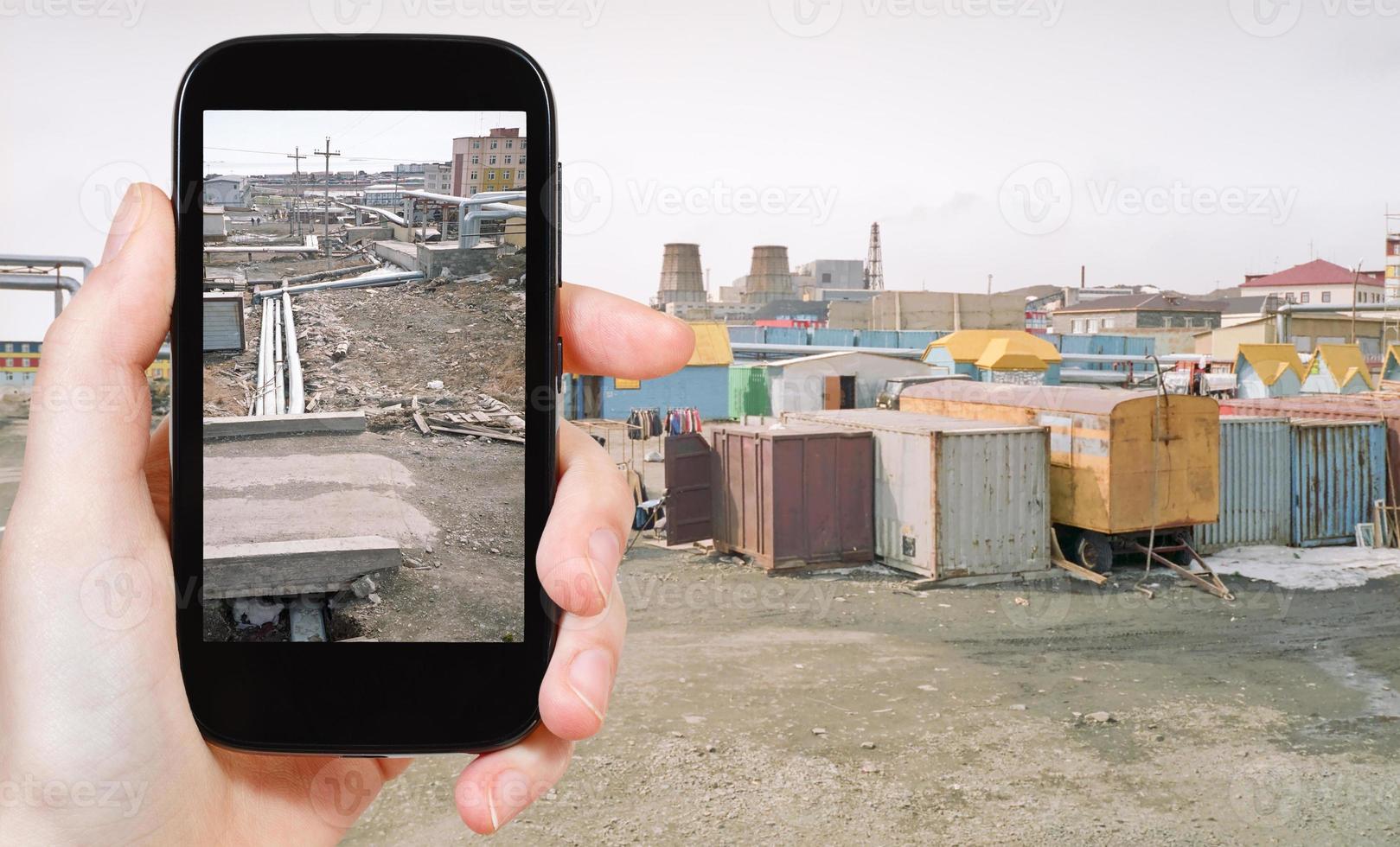 tourist taking photo of street market in Anadyr