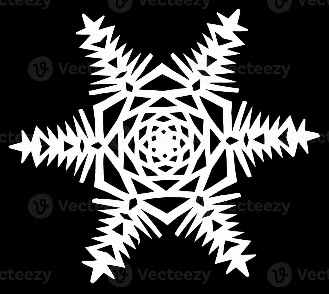 snowflake on black paper photo