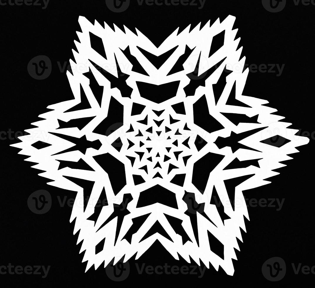 snowflake on black paper photo