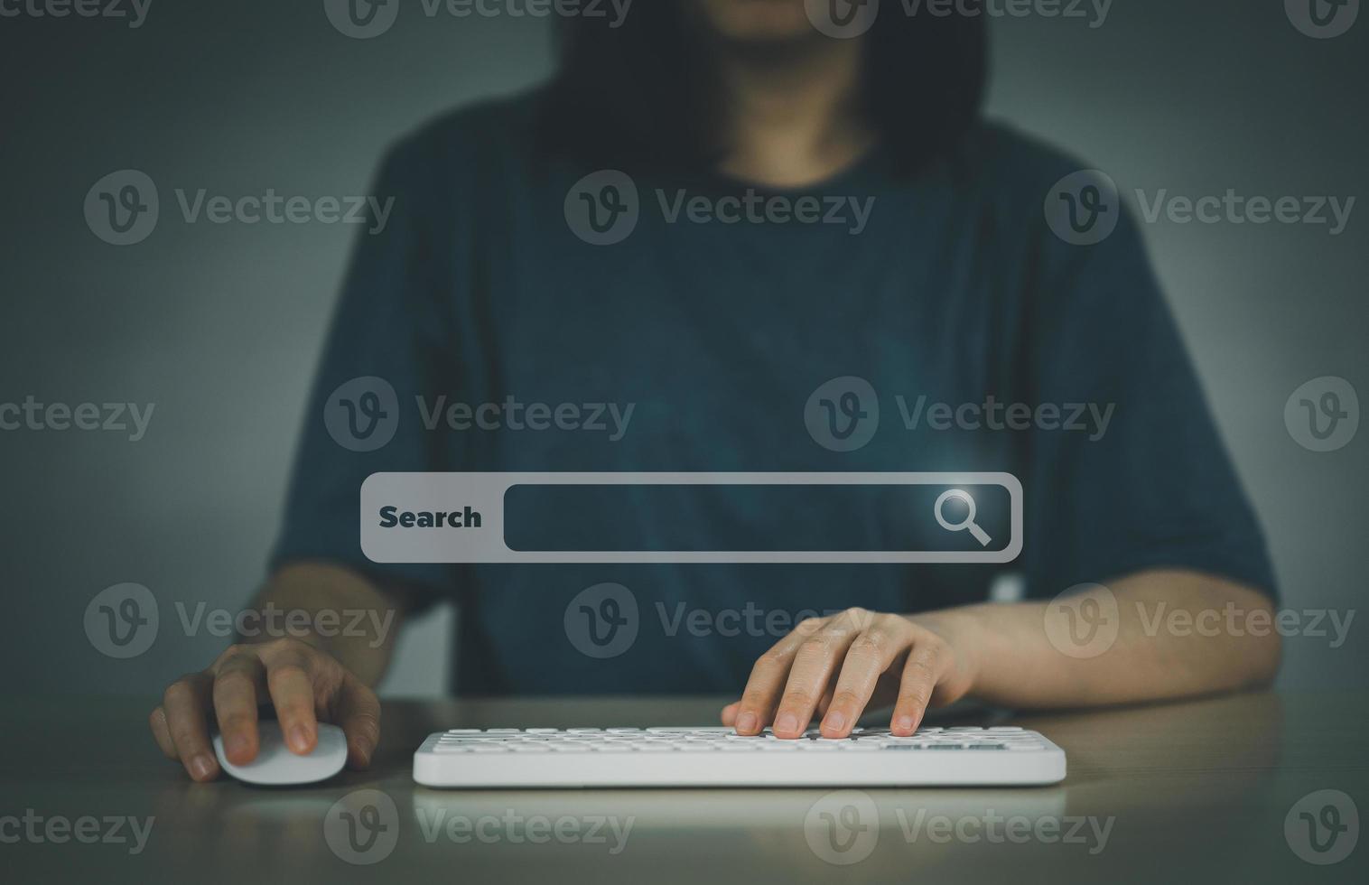 Woman searching browsing internet data information with blank search bar. Search engine optimization SEO networking concept. businessman working with computer laptop on desk. photo