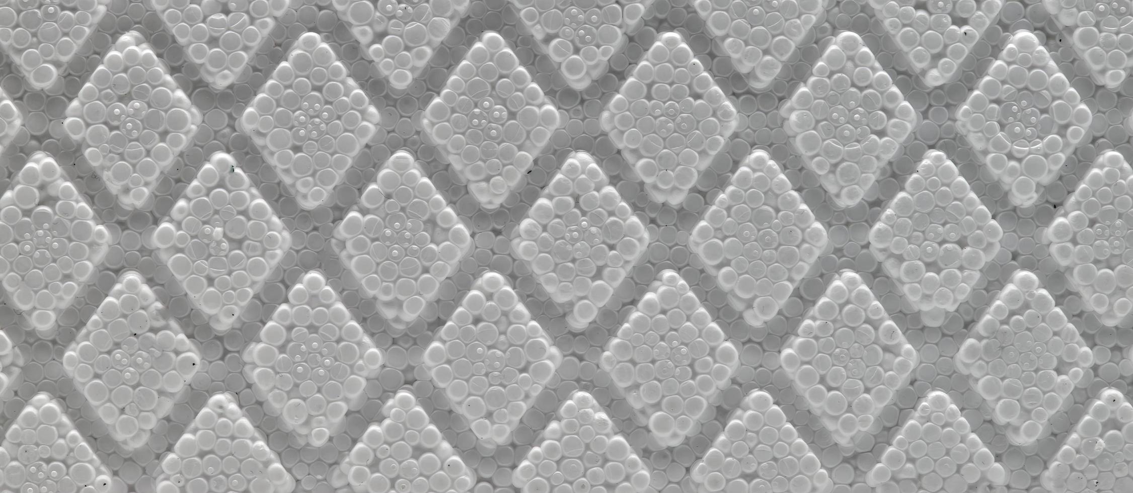 Polystyrene cells foam view as background photo