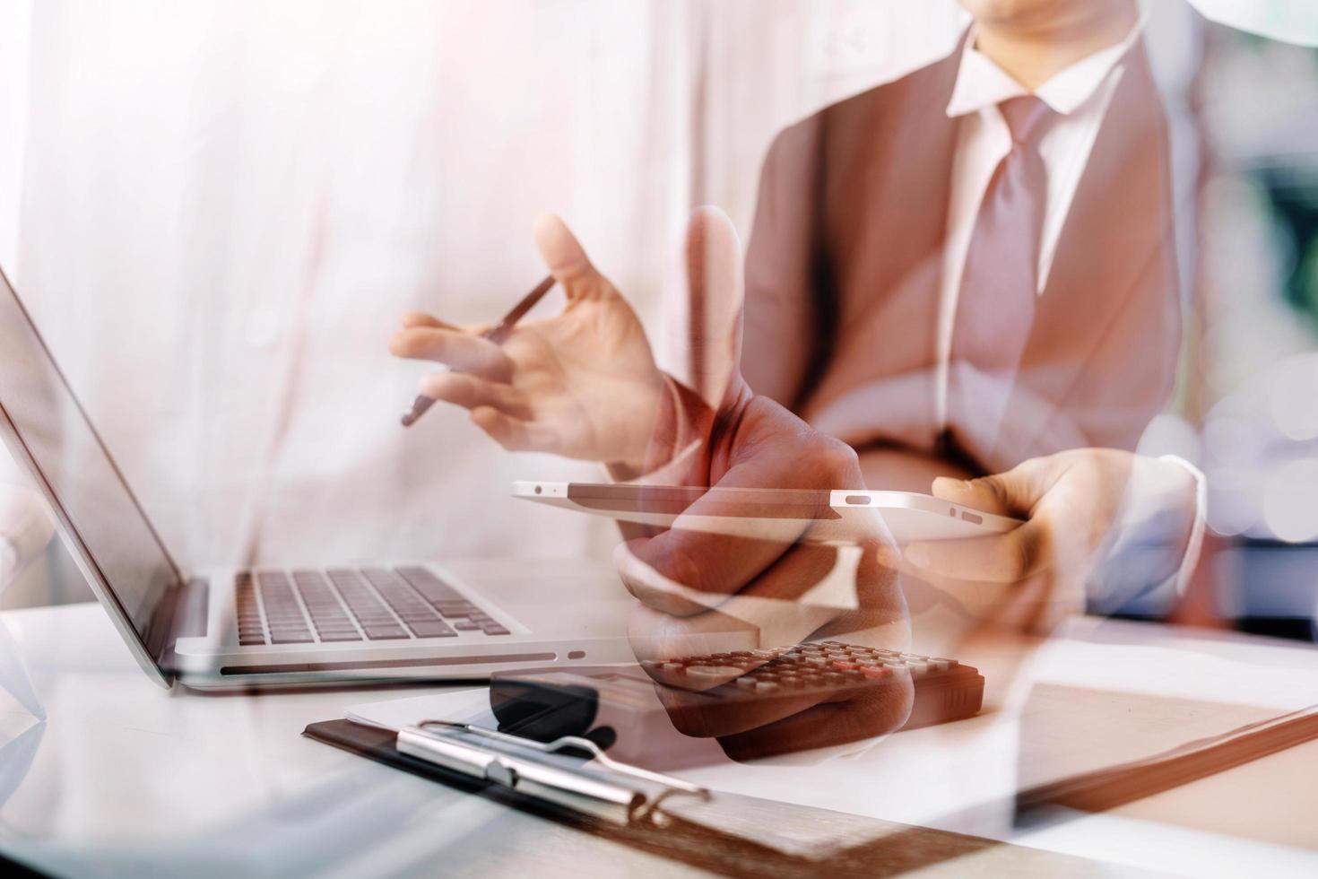 businesswoman hand working with laptop computer, tablet and smart phone in modern office with virtual icon diagram at modernoffice in morning light photo