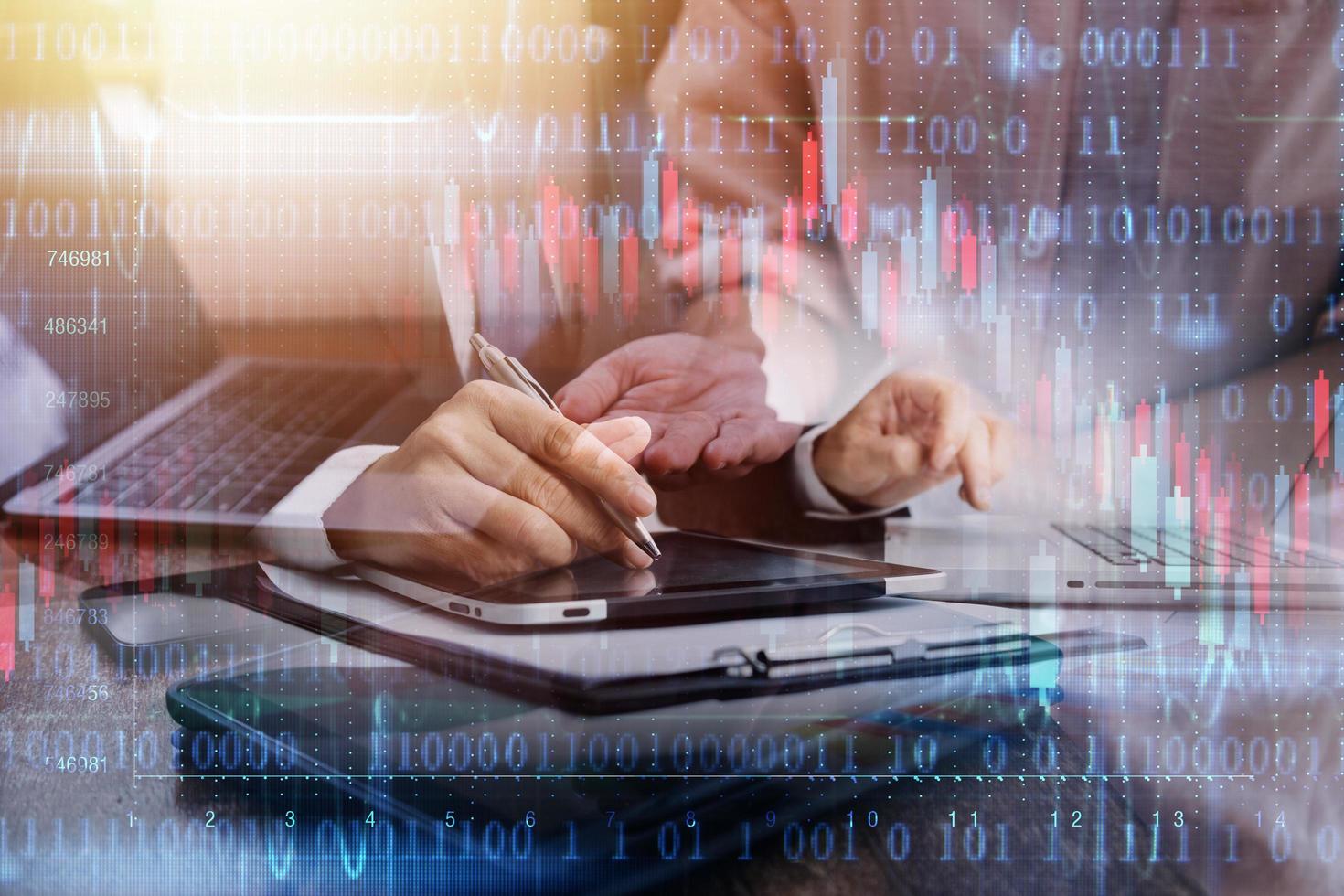 businesswoman hand working with laptop computer, tablet and smart phone in modern office with virtual icon diagram at modernoffice in morning light photo